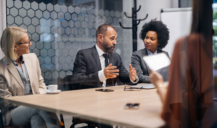 Boardroom meeting with diverse executives