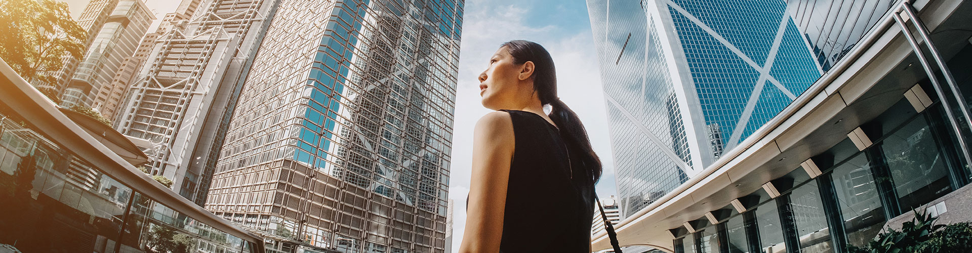 Woman walking in a busy city