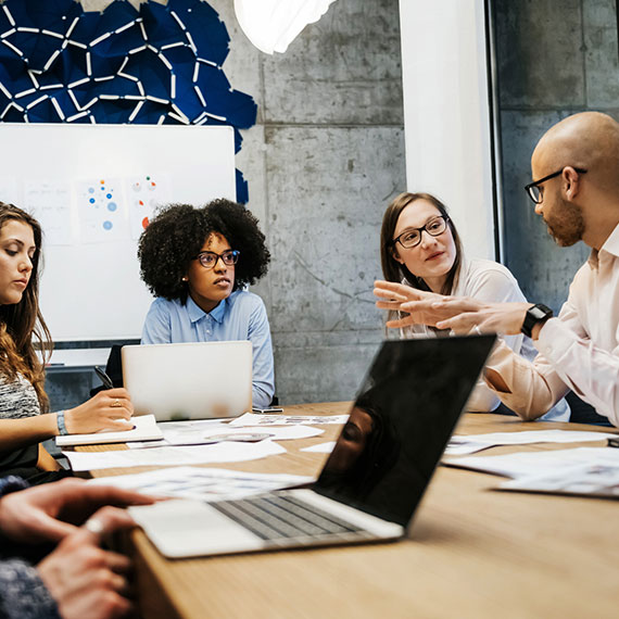 A group of people in a meeting