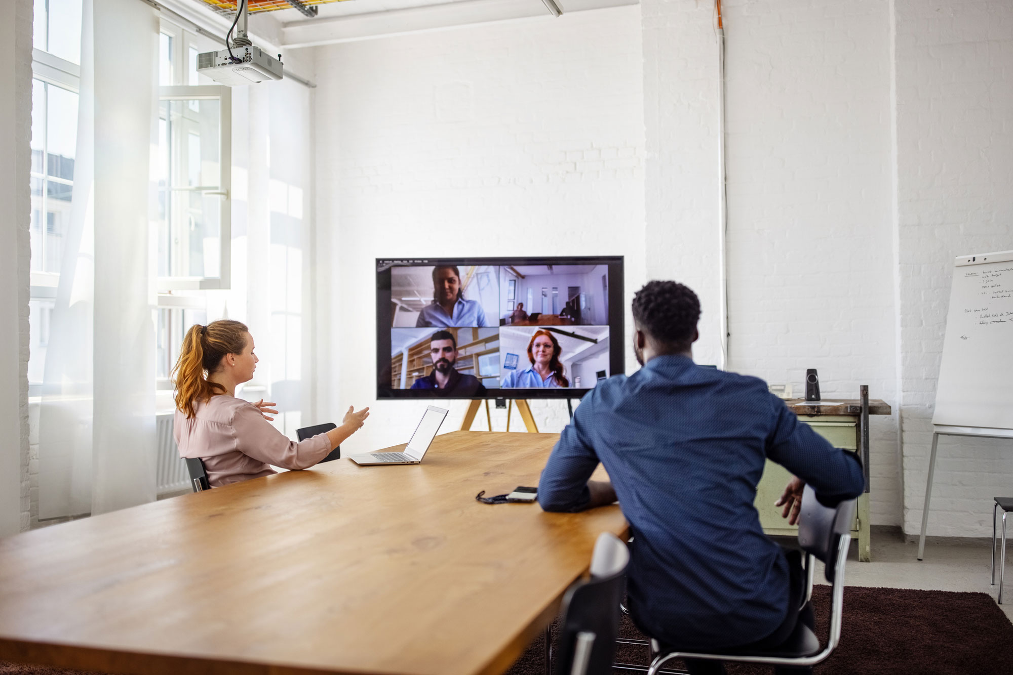 Businesspeople having a video conference in office