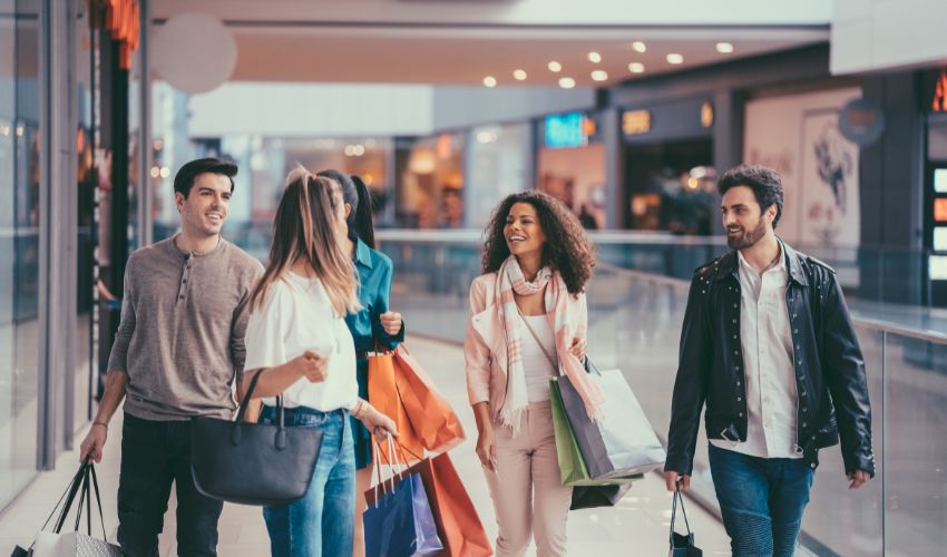 Group of young adults shopping