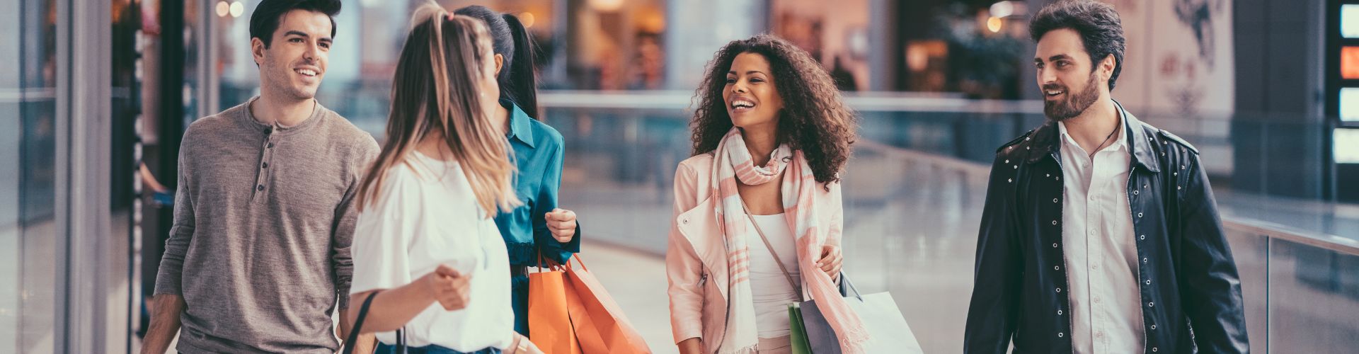 Group of young adults shopping