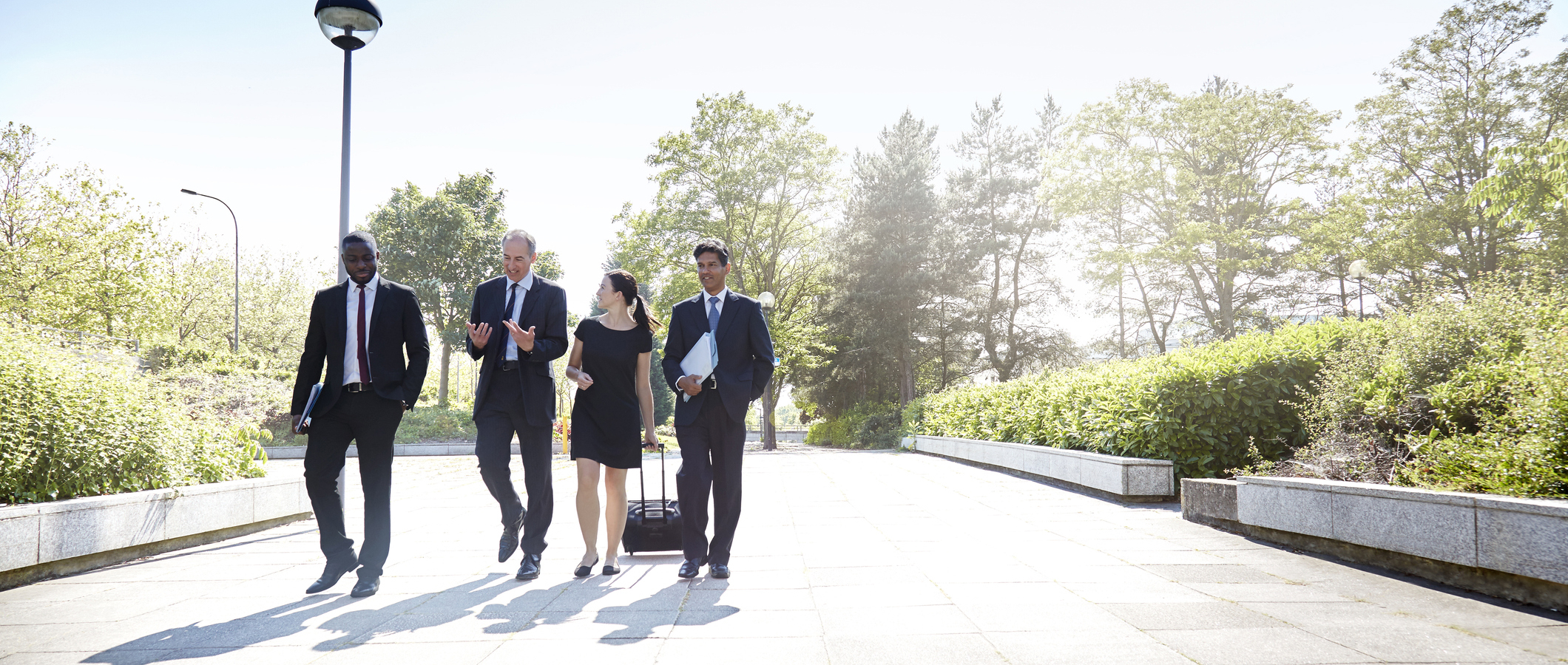 business people walking outdoors
