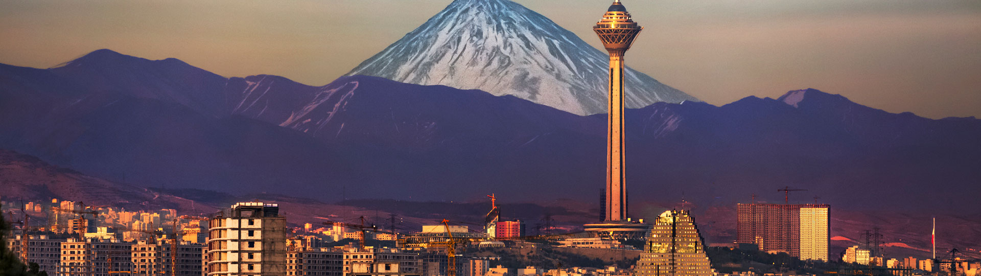 The Tehran cityscape with mountains in the background