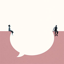 Two people sitting on opposite sides of a giant speech bubble