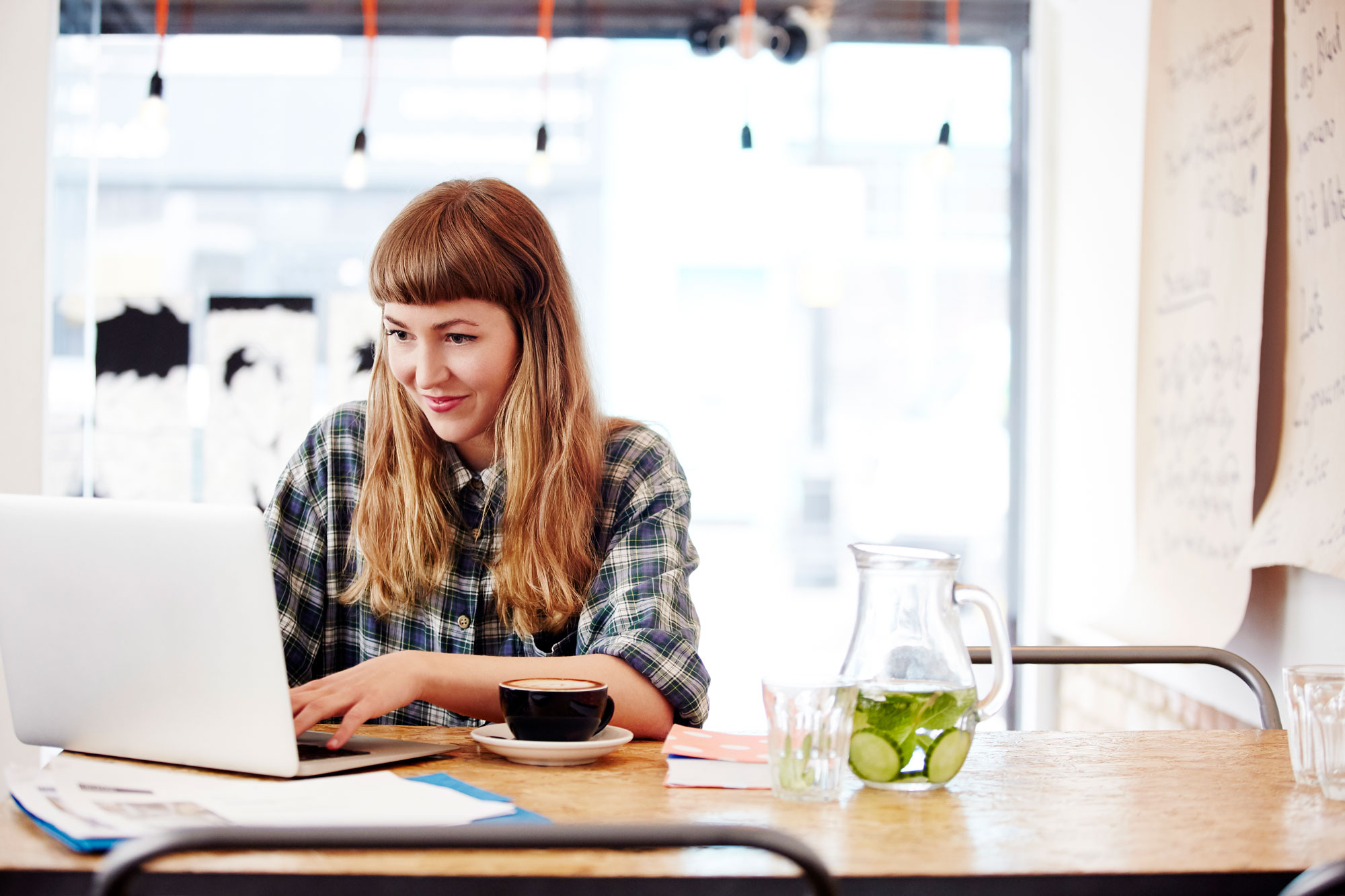 Young woman working at a desk