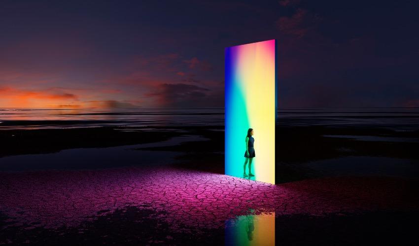 Lady standing in front of light source