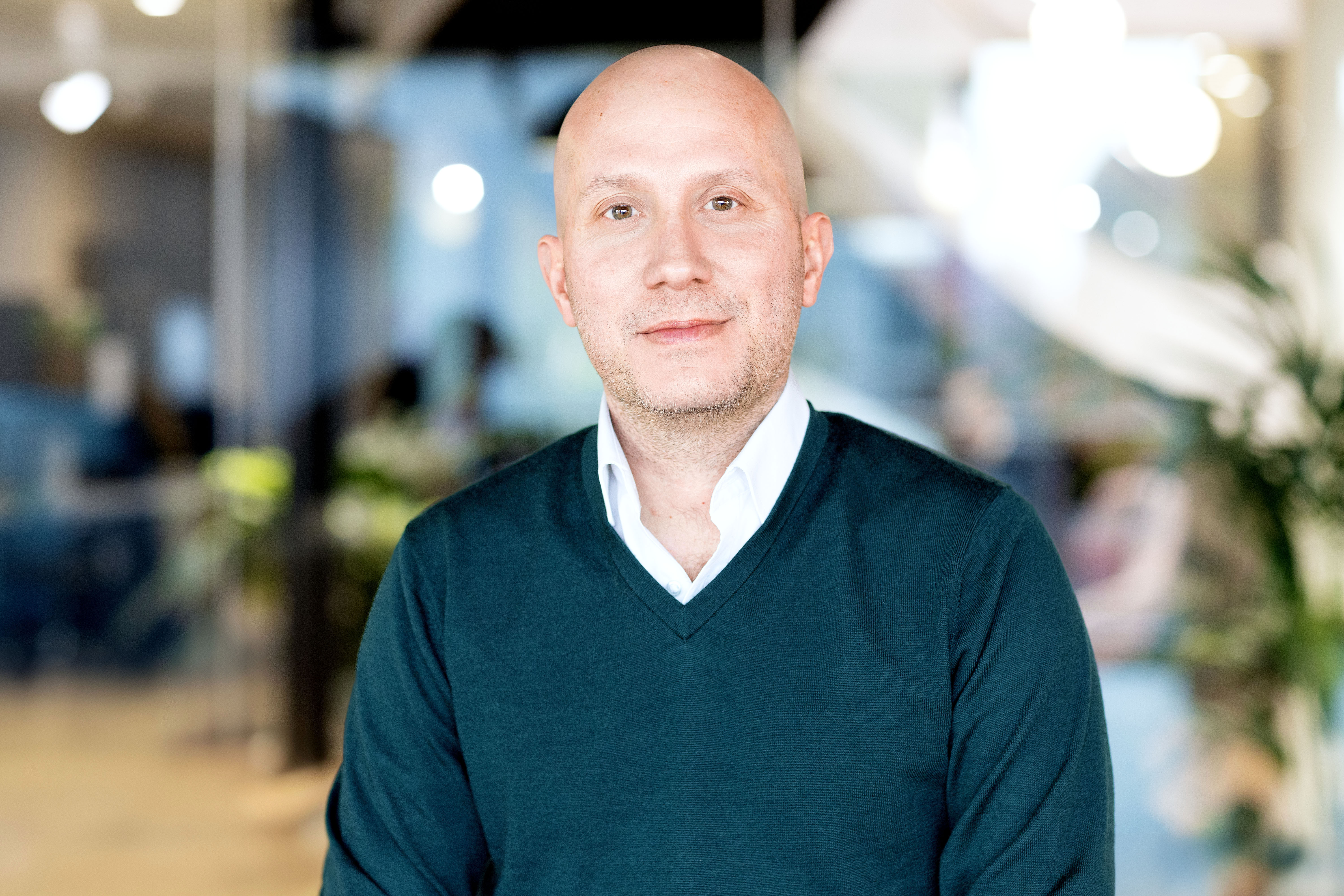 A professional headshot of Chris Griffiths