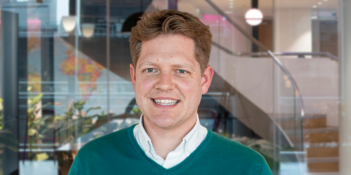 A professional headshot of Paul Mihajlovic